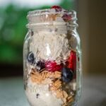 Layered cracked cannoli dessert in mason jar