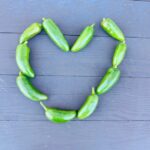 Green peppers arranged in heart shape
