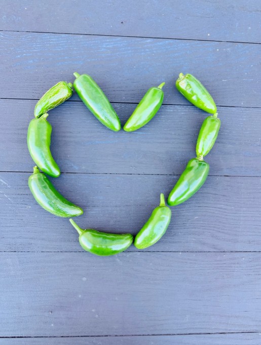 Green peppers arranged in heart shape