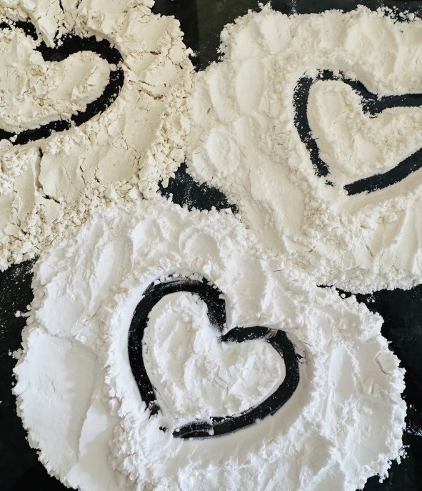 Flour arranged in heart shapes