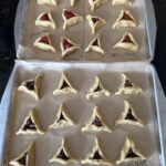 Baking trays with filled pastries